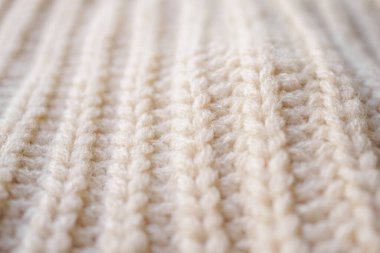 Kapat bej örgü yün kumaş dokusu arkaplanı