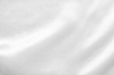 Yumuşak dalga dokusu arka planına sahip soyut beyaz kumaş