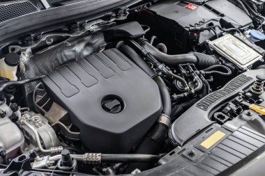 modern car engine under hood close up detail