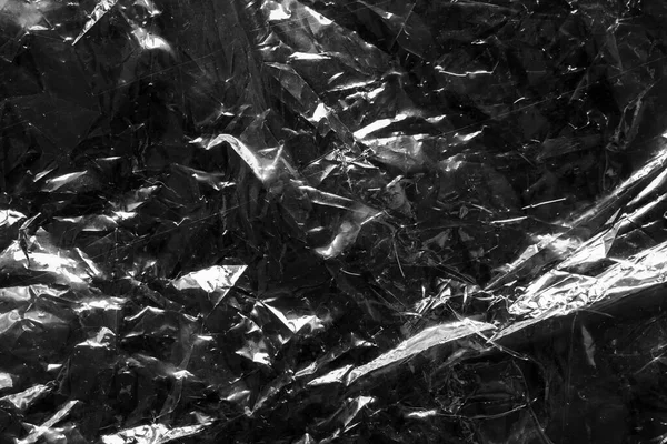 Transparent Plastic Bag Film Wrap Overlay Texture Black Background — Stockfoto