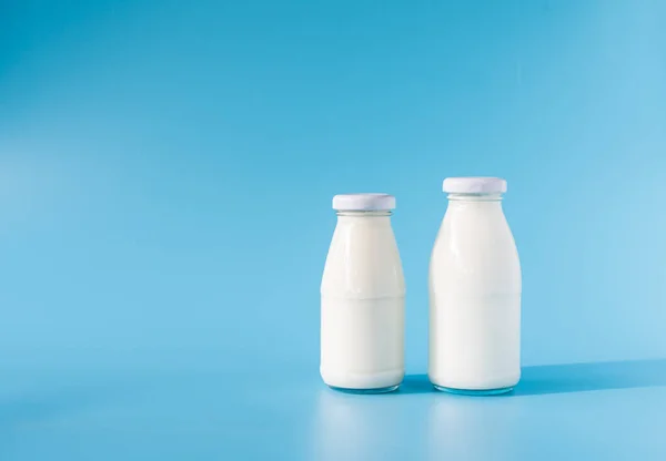 Beverage Liquid Milk White Fresh Natural Two Glass Bottles Table — Stock fotografie