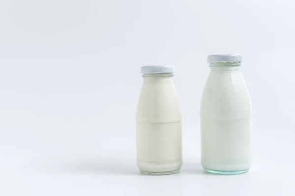 Beverage Liquid Milk White Fresh Natural Two Glass Bottles Table — Stock fotografie