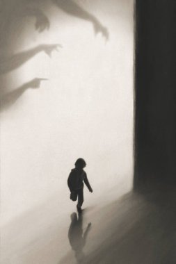 young boy runs away frightened by shadows of hands on the wall who want to catch him