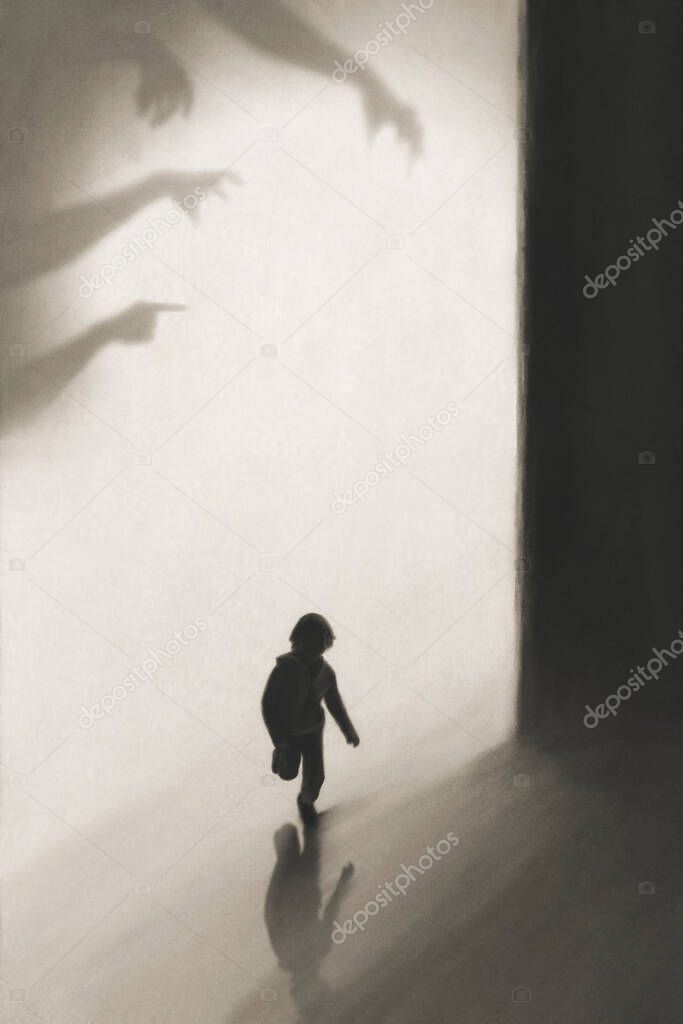 young boy runs away frightened by shadows of hands on the wall who want to catch him