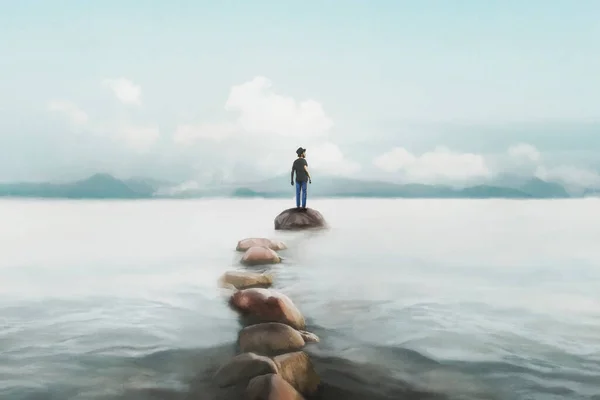 超現実的な男が石の道を通って湖の真ん中の岩に到達成功の概念 — ストック写真