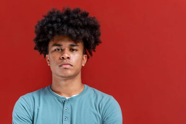 Portrait Serious African American Man Looking Camera Isolated Red Background Immagine Stock