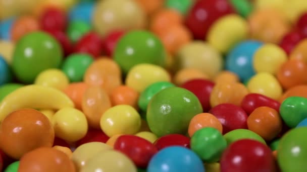 Mehrfarbige Süßigkeiten Und Kaugummi Rotierenden Hintergrund — Stockvideo