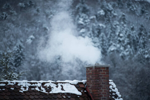 Smoking Chimney Wintry Landscape Royalty Free Stock Photos