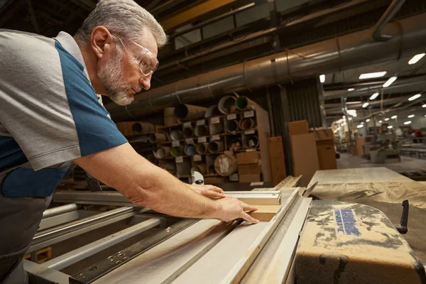 Portrait of serious craftsman laboring in his workshop — Foto Stock