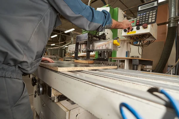 Close up of craftsman working with modern equipment — ストック写真