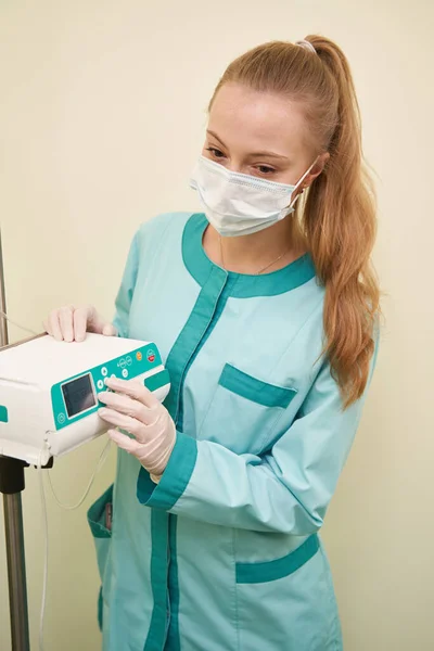 Portrait of young practitioner working in modern clinic — Stock Photo, Image