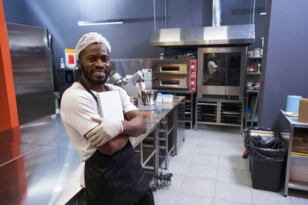 Chef in uniform resting after hard work