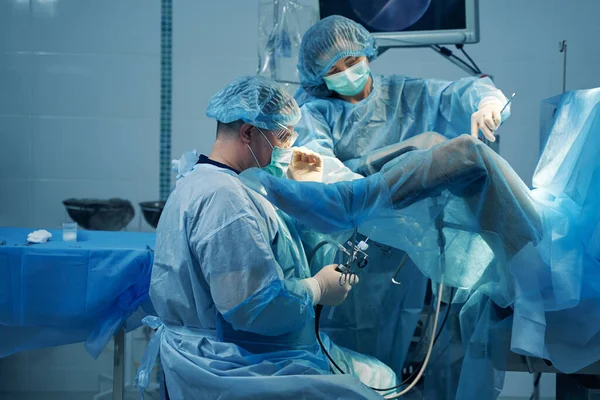 Unrecognizable Woman Lying Gynecological Chair Careful Doctors Inserting Hysteroscope Her — Fotografia de Stock