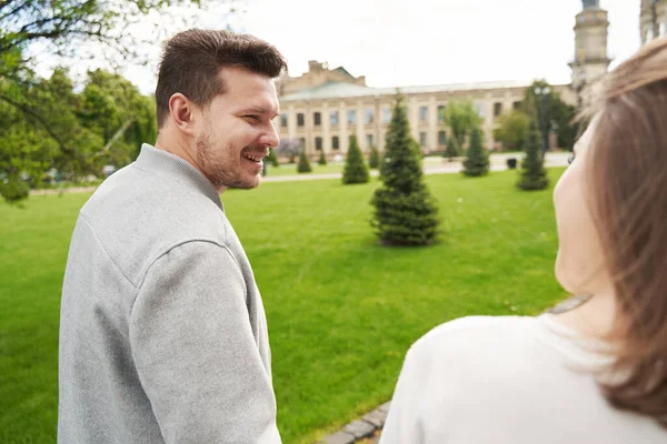 Happy Man Looking Girlfriend Smiling While Enjoying Date Outdoors — Stockfoto