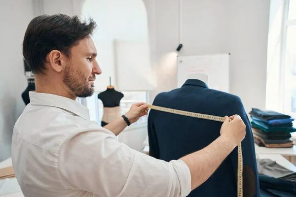 Satisfied Fashion Designer Stands Sewing Workshop Male Mannequin While His — Foto de Stock