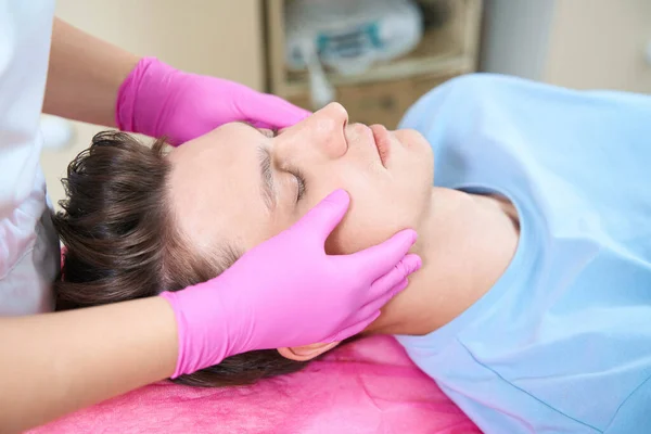 Top View Close Male Head Lying Couch Female Beautician Hands — Stockfoto