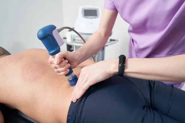 Close Female Doctor Hands Using Medical Pain Relief Device While — Foto de Stock