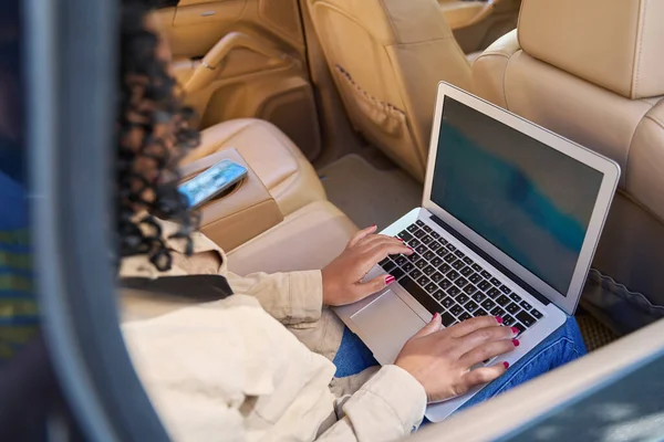 African American Woman Works Laptop Back Seat Modern Comfortable Car — 스톡 사진