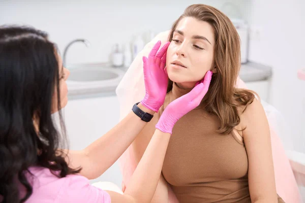 Delighted Woman Sits Front Health Worker While She Does Pre — Fotografia de Stock