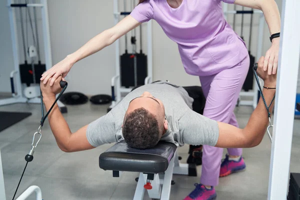 Male Patient Using Medical Kinesiotherapy Equipment While Having Rehabilitation Gymnastics — Photo