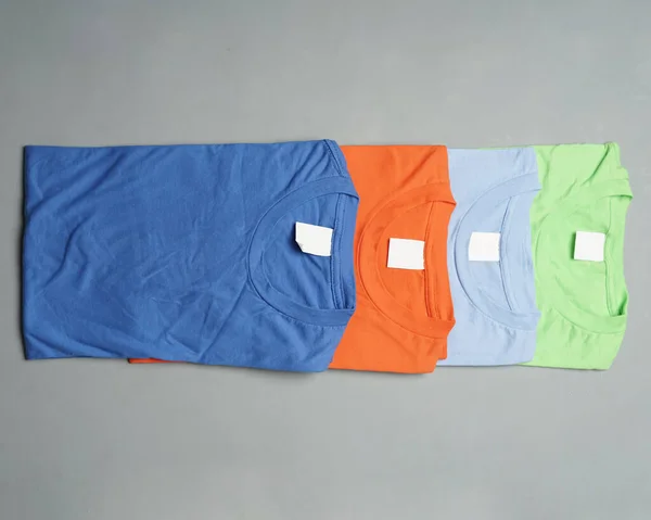 Düzgünce Düzenlenmiş Düz Pamuklu Tişörtler Düz Renkli Tişörtler Tasarım Modellerine — Stok fotoğraf
