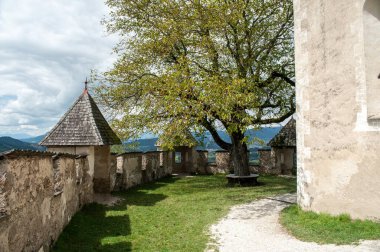 Courtyard of Hochosterwitz Castle in Carinthia, Austria. Today, the protective wall defending the castle serves as a view of the surrounding countryside for tourists.