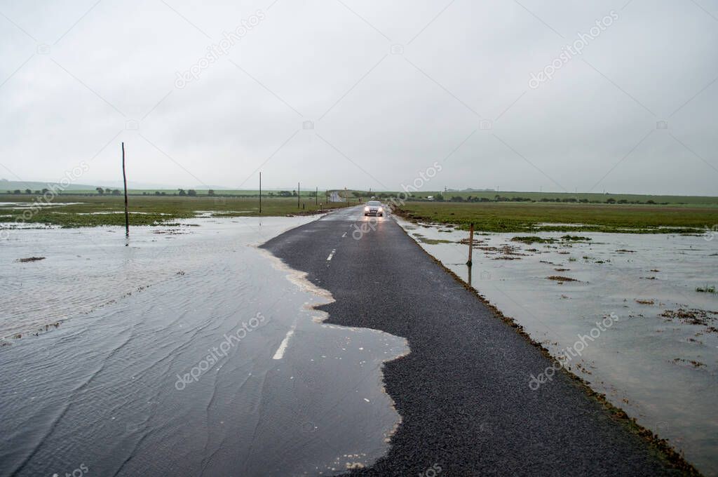 Road to Holy Island in England flooded by the sea at high tide.