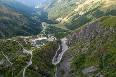 Winding road in the valley below the Grande Dixence Dam in Switzerland.