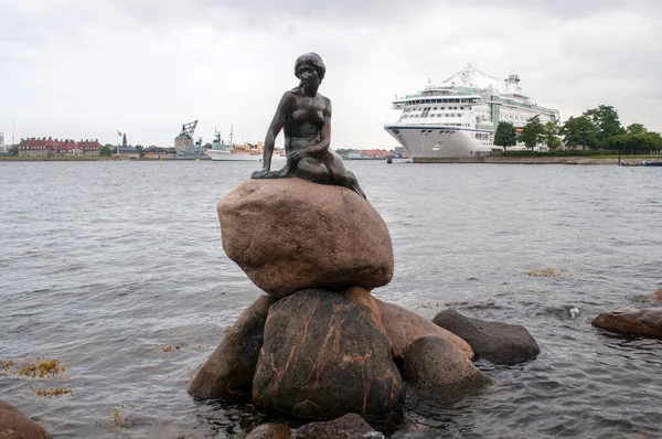 Statue of a little mermaid on the sea coast in Denmark in the city of Copenhagen.