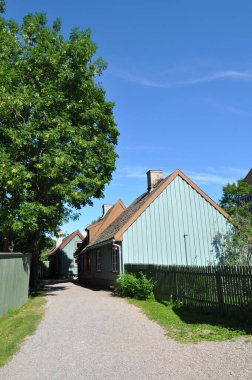 Oslo, Norveç - Bygdoy yarımadasında eski ahşap ve tuğla binalar. Oslo 'daki Norveç Açık Hava Müzesi.