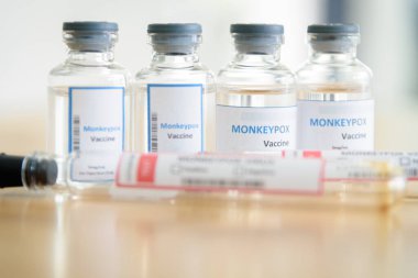 Vaccine vial for Monkeypox and antigen blood test tube.