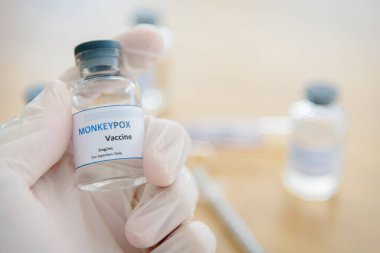 Vaccine vial for Monkeypox or Clade (Smallpox vaccine). clipart