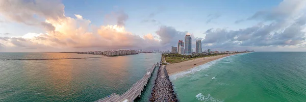 Drone panorama over Miami Beach skyline at dusk — стокове фото