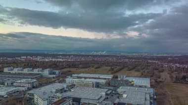 Time-lapse drone video of the industrial area of the southern Hessian town of Moerfelden-Walldorf during the sunset