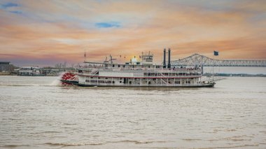 Image of a paddle steamer on the Mississippi River near New orleans at dusk