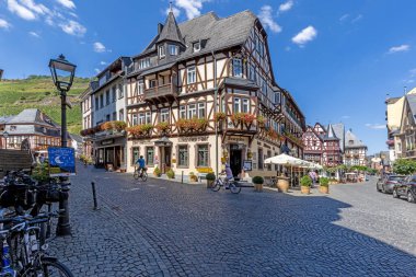 Panoramic view over the historic half-timbered houses of the idyllic German wine village Bacharach on the Rhine river in summer