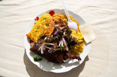 Traditional dish in the Peruvian Andes. Roasted guinea pig is one delicious food from Cusco Peru.