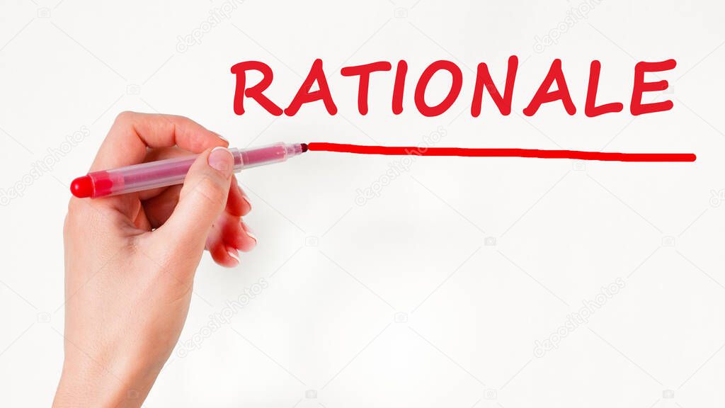 left hand writing inscription rationale with red color marker, concept, stock image