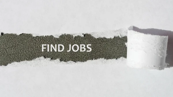 Texto Encontrar Empregos Que Aparecem Por Trás Rasgado Papel Branco — Fotografia de Stock