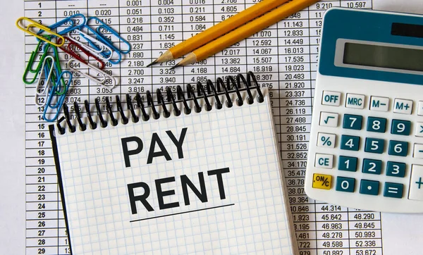 Pay Rent Woorden Een Notitieboekje Achtergrond Van Een Tabel Met — Stockfoto
