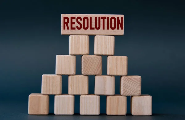 Resolution Word Wooden Cubes Dark Gray Background Info Concept — Stockfoto