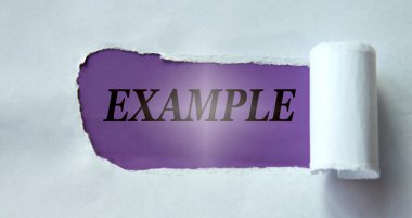EXAMPLE - word on a purple background and torn white paper.