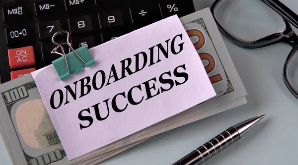 Onboarding Success Woord Een Wit Stuk Papier Gefixeerd Bankbiljetten Tegen Stockafbeelding
