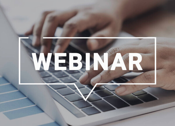 Person using a laptop computer for online training webinars. E-learning browsing connection and cloud online technology webcast concept. Laptop mockup with clipping path on screen.