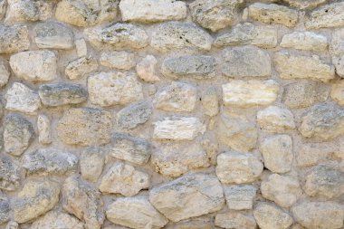 Eski taş duvar. Arkaplan ya da doku olarak taş duvar