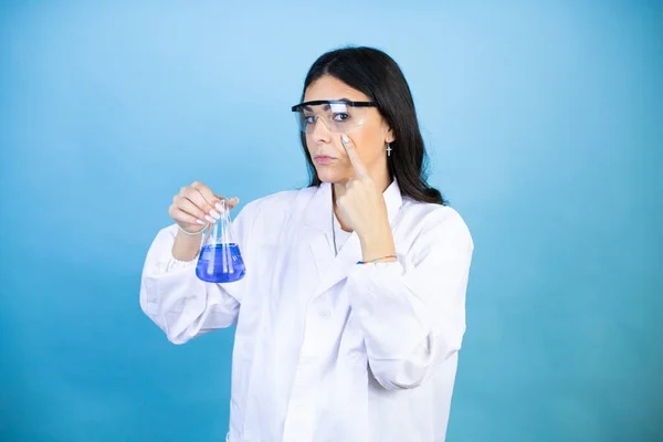 Young Brunette Woman Wearing Scientist Uniform Holding Test Tube Isolated — Stock Photo, Image