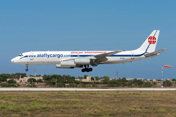 Luqa, Malta - July 5, 2007: African International Airways McDonnell Douglas DC-8-62H(F) (REG: ZS-OSI) landing runway 32.