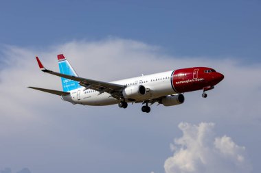 Luqa, Malta - August 12, 2022: Norwegian Air Sweden Boeing 737-84P (REG: SE-RXA) landing with some bad weather in the background.
