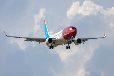 Luqa, Malta - August 12, 2022: Norwegian Air Sweden Boeing 737-84P (REG: SE-RXA) landing with some bad weather in the background.