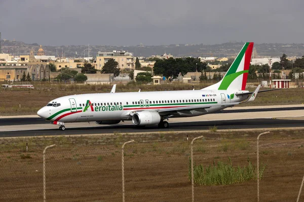 Luqa, Malta - August 19, 2022: Aeroitalia Boeing 737-85F (REG: 9H-CRI) backtracking runway 31 for takeoff.